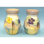 A pair of Clarice Cliff Dulcinea Pansy-pattern vases, 20.5cm high.
