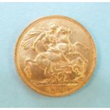 An Edward VII 1905 gold sovereign.