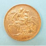 An Edward VII 1904 gold sovereign.