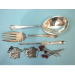 A pair of sterling silver salad servers, a silver lobster pick, a pair of pierced silver spirit