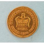 A George III 1804 gold third-guinea.