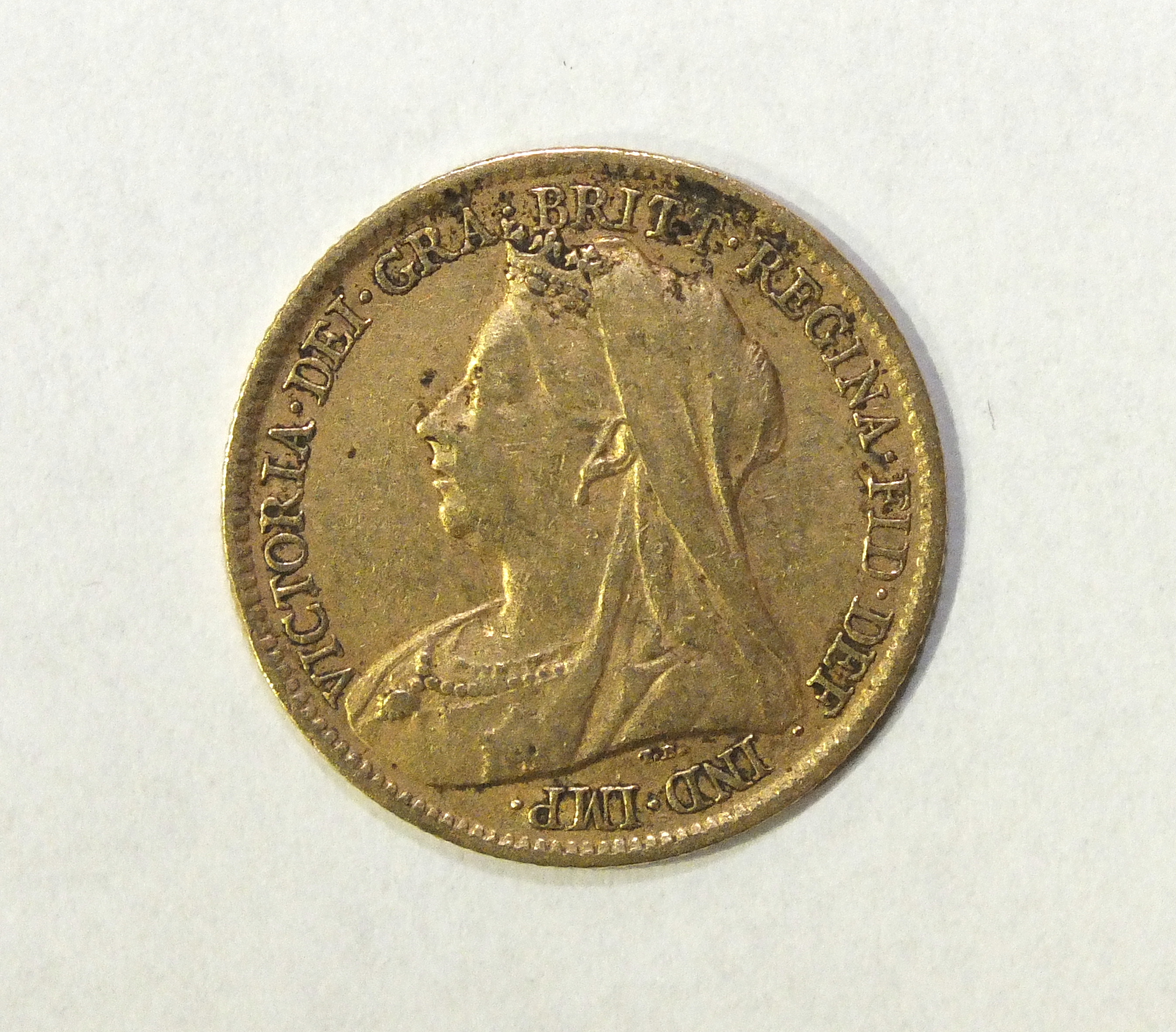 A Queen Victoria 1900 gold half sovereign.