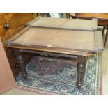 A mahogany extending dining table on turned legs, 117 x 231cm, including two spare leaves.