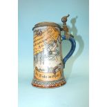 A late-19th/early-20th century Mettlach stein designed by Heinrich Schlitt, decorated with an
