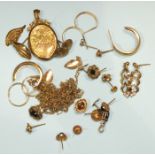 A 9ct gold locket, a small pendant and other items, including some unmarked yellow metal.
