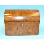 A burr walnut two-division tea caddy, the domed lid enclosing two lidded compartments, 22cm wide,