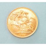 A George V 1913 gold sovereign.