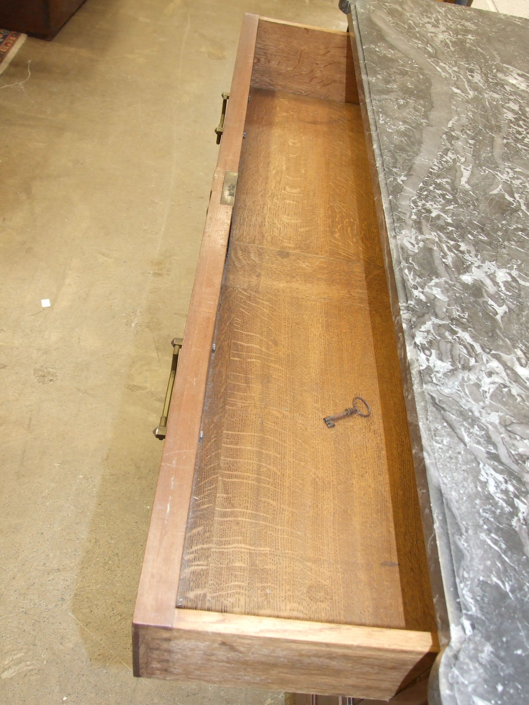 A late-19th century French walnut chest of three long drawers, within stock-fluted pilasters on - Image 2 of 2