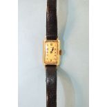B.C.P, a lady's 14ct gold rectangular-face wrist watch, on leather strap.