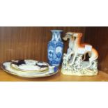 Two 19th century Staffordshire greyhound models, three Coalport blue and white plates and a modern