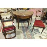 A 19th century mahogany fold-over tea table on square tapered legs and spade feet, 96cm wide and