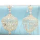 A pair of clear glass light fittings with cut drop, 16cm diameter, 40cm high, (2).