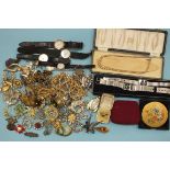 A quantity of costume jewellery and wrist watches.