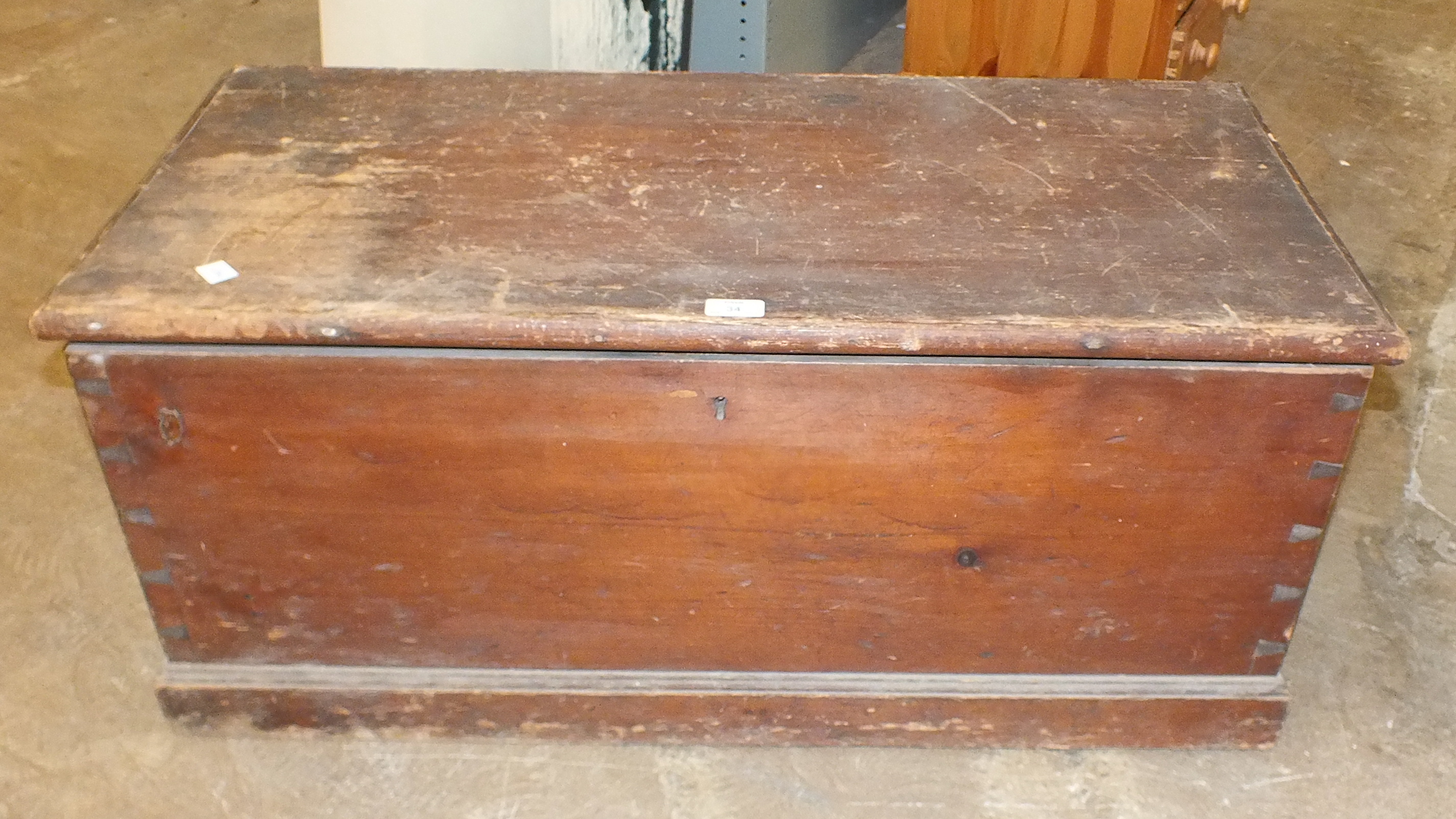 A metal-bound pine chest, 74cm wide, 59cm high, 50cm deep and a pine tool chest, 92cm wide, (2).