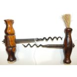 A rosewood-handled corkscrew with cutaway spiral helix and handle brush and another 19th century