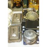 Two plated entrée dishes, various plated cutlery and other plated ware.