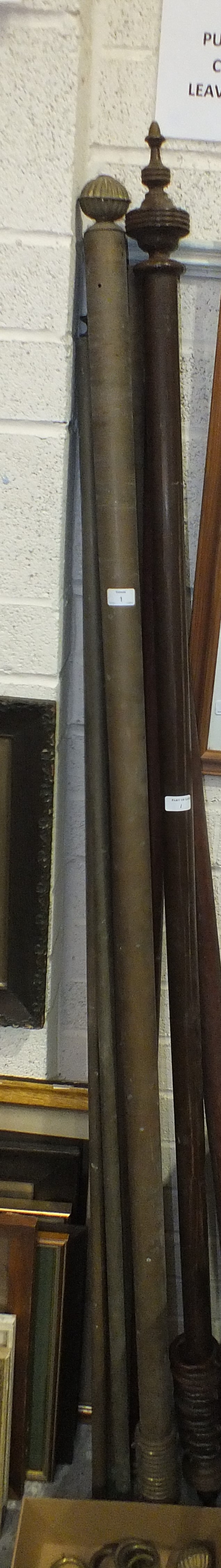 A pair of brass curtain poles, each end fitted with finials, 202cm long (without finials), 210cm