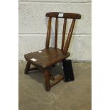 A child's elm stick-back chair, 41cm high.