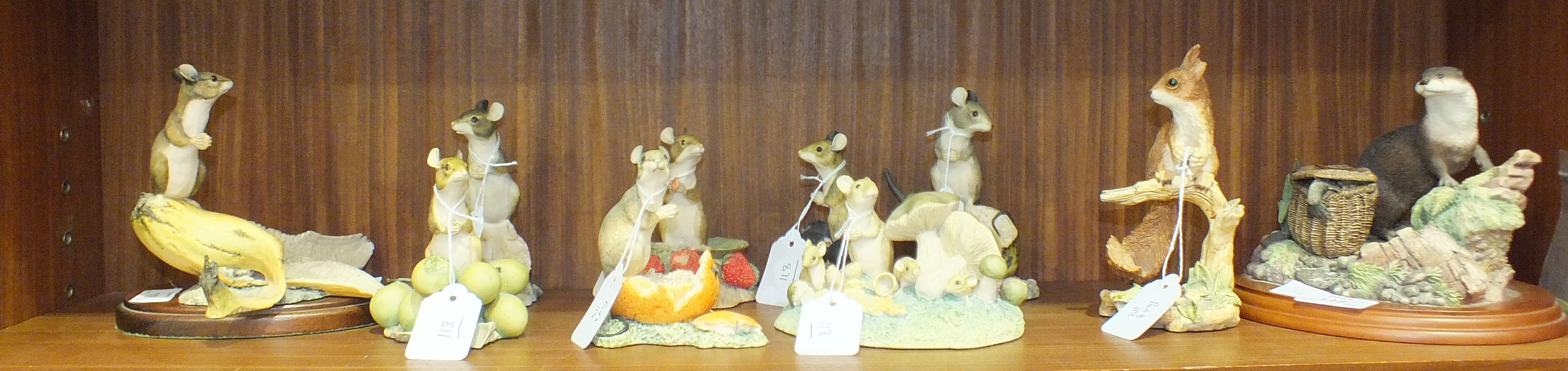 A collection of ten Border Fine Art animal models, including 'Mouse on banana', 'Mouse on green
