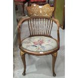 A late-Victorian mahogany tub chair inlaid with boxwood and ivory, (a/f).