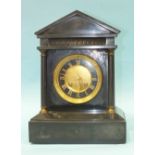 A black marble architectural mantel clock having a French drum gong-striking movement, 32cm high.