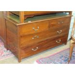 An inlaid mahogany low chest/table fitted with two short and two long drawers, the rectangular top