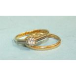 An 18ct gold wedding band and an 18ct gold ring set white stones, 4.3g total, (2).