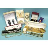 Two boxed wrist watch sets, a Swarovski brooch, boxed and other costume jewellery.