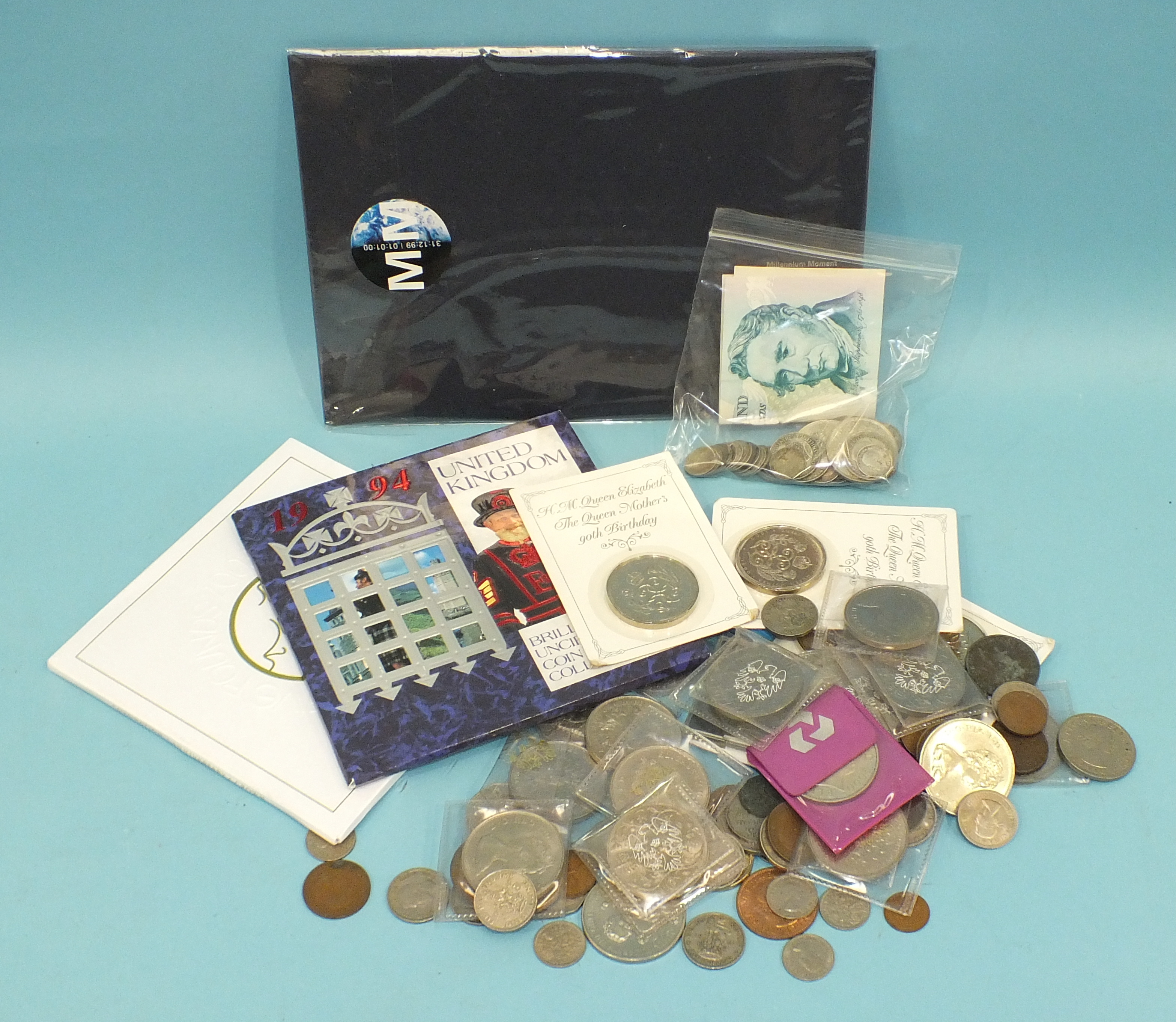 A small collection of British coins, including pre-1947 silver, 2 x Gill £5 notes, 5 x £5 crowns,