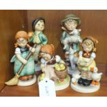 A collection of five Goebel figures, 'Shepherd's Boy', 13.5cm, 'Chick Girl', 9cm, 'Little