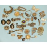 A quantity of silver and white metal filigree jewellery, including several butterfly brooches and