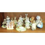 A collection of fourteen Royal Albert Beatrix Potter figures, including 'Timmy Willie Sleeping', '