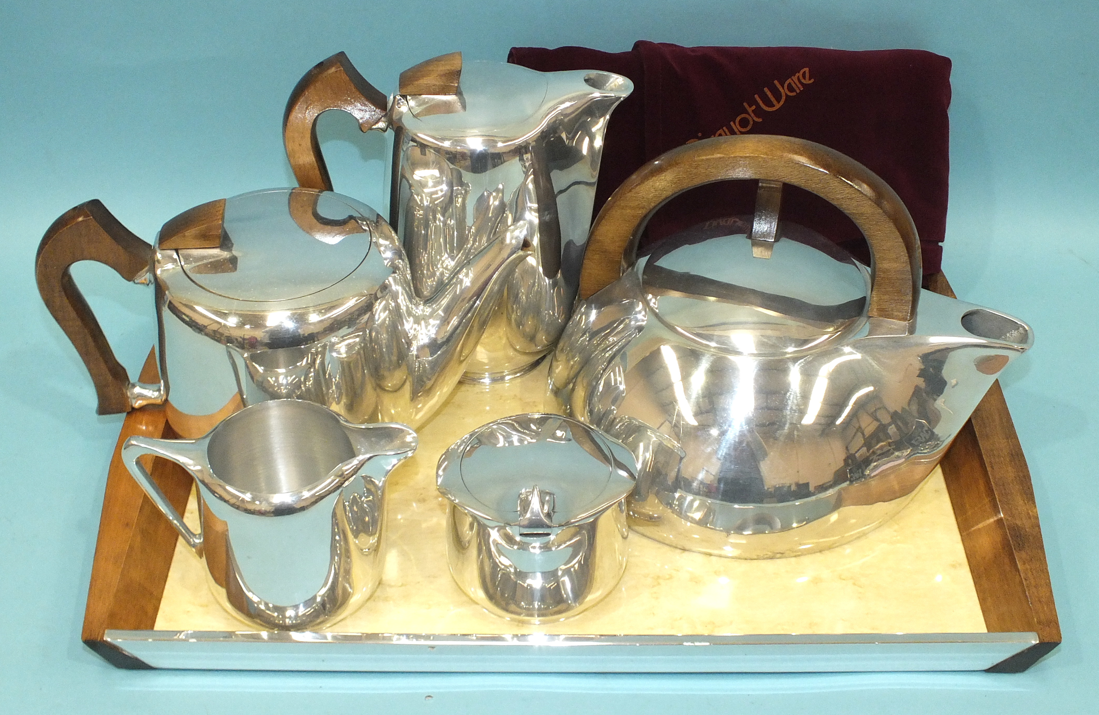 A five-piece Picquot Ware tea service, including a kettle, on tray.