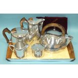 A five-piece Picquot Ware tea service, including a kettle, on tray.