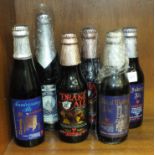 Two 275ml bottles of Courage 'Drake 400 Ale', two 275ml bottles of 'Silver Jubilee Ale', a 275ml