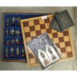 A Franklin Mint 'The Battle of Waterloo Chess Set', with pewter pieces, in fitted box with