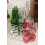 A small quantity of coloured and clear glassware, including two decanters, green glass vases and