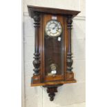 A late-19th century stained wood Vienna-style striking wall clock, 76cm high, a modern mahogany