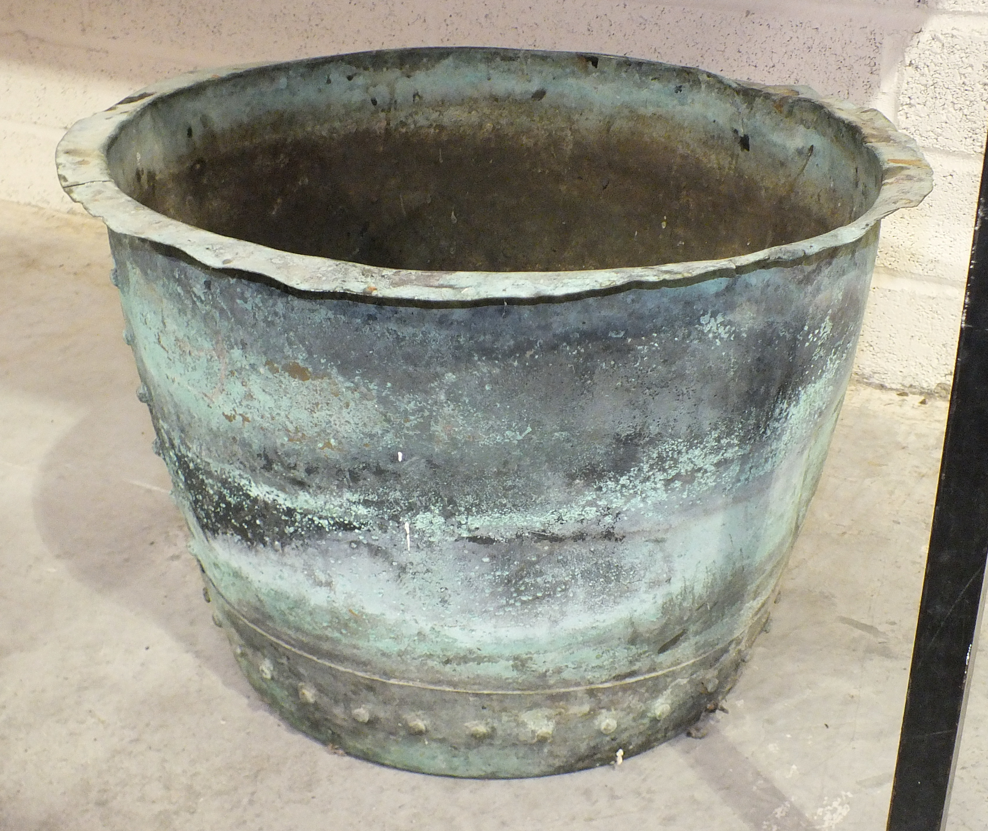 A copper planter, 34cm high, 50cm diameter.