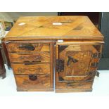 An Oriental parquetry jewellery box, converts to pedestal table fitted with doors and drawers,