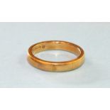 A 22ct gold wedding band, size M½, 6g.