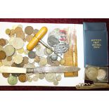 A quantity of coins, a boxwood and brass rope gauge and other items.