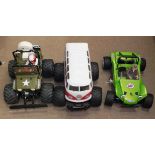 A remote-controlled "Wild Willy 2" stunt jeep, a VW "Lunchbox" stunt vehicle and a Tamiya BCHBUMP