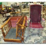 An early-20th century deck-style folding chair, an oak reclining chair and an upholstered Ottoman