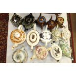 A collection of fourteen 19th century lustre and other teapots.