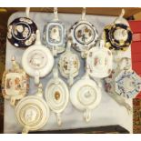 A collection of twelve 19th century and later ceramic teapots.