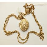 A 9ct gold locket on chain, gross weight 9.1g.