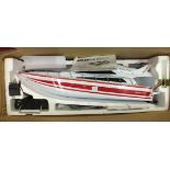 A Sport Atlantic 3837 remote-control Luxury Racing Boat with controller, battery, charger, etc.