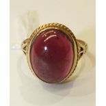 A 9ct gold ring set garnet cabochon, size O½, 5.1g.