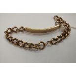 A 9ct gold curb-link identity bracelet, 24.7g, (chain worn through).